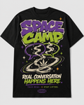 Black graphic tee artwork featuring Space Camp lettering, colorful speech bubbles, smoke trails, stars, and a cosmic leaf